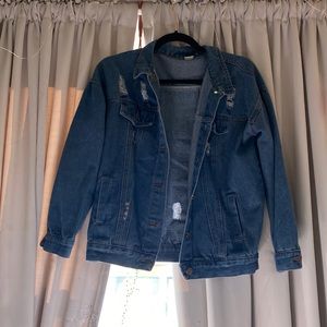 Distressed denim jacket — timeless piece!